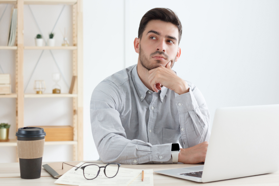 Young business man thinking what is an electronic mailing list