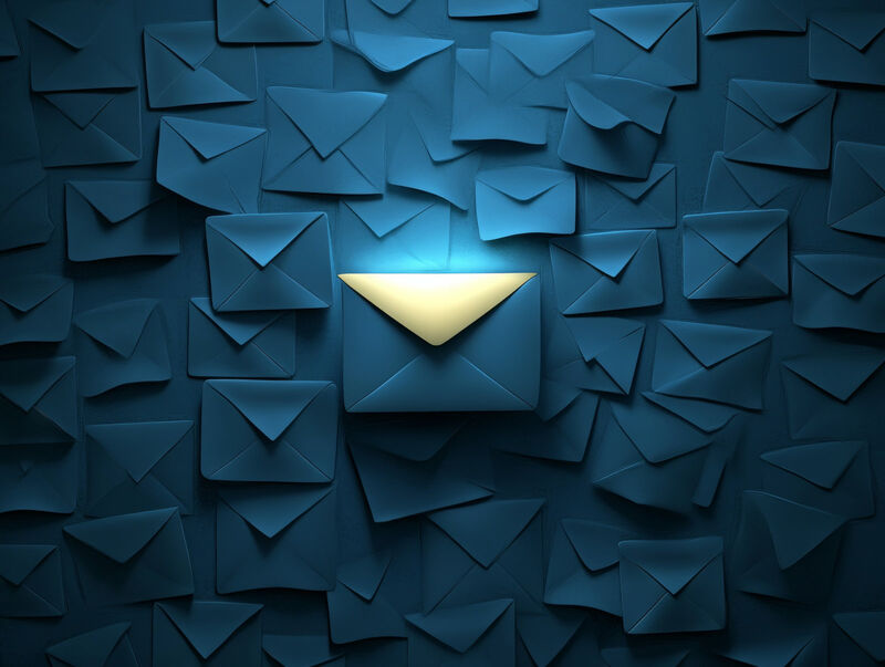 An image showing an envelope standing out from lots of other envelopes