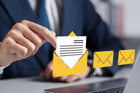 A picture showing a number of similar envelopes with one opened